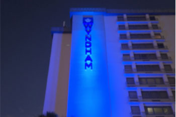 DVT Light PJ-5 RGBW Outdoor LED Wash Lights shining on Wyndham logo Wyndham I-Drive Avanti Resort & Conference Center, Orlando, Florida