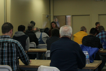 Lisa Hansen, Field Technician, teaching a class in the tech area, Techni-Lux 25th Anniversary Open House 2016, Orlando, Florida USA