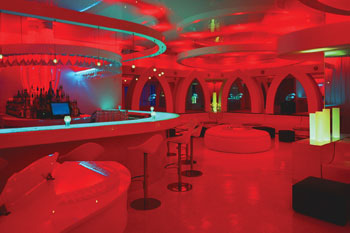 shiney interior illuminated in vibrant hues of aqua, red and white colors  Pulse - Orlando, Florida, USA